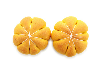 Tasty pumpkin shaped buns isolated on white, top view