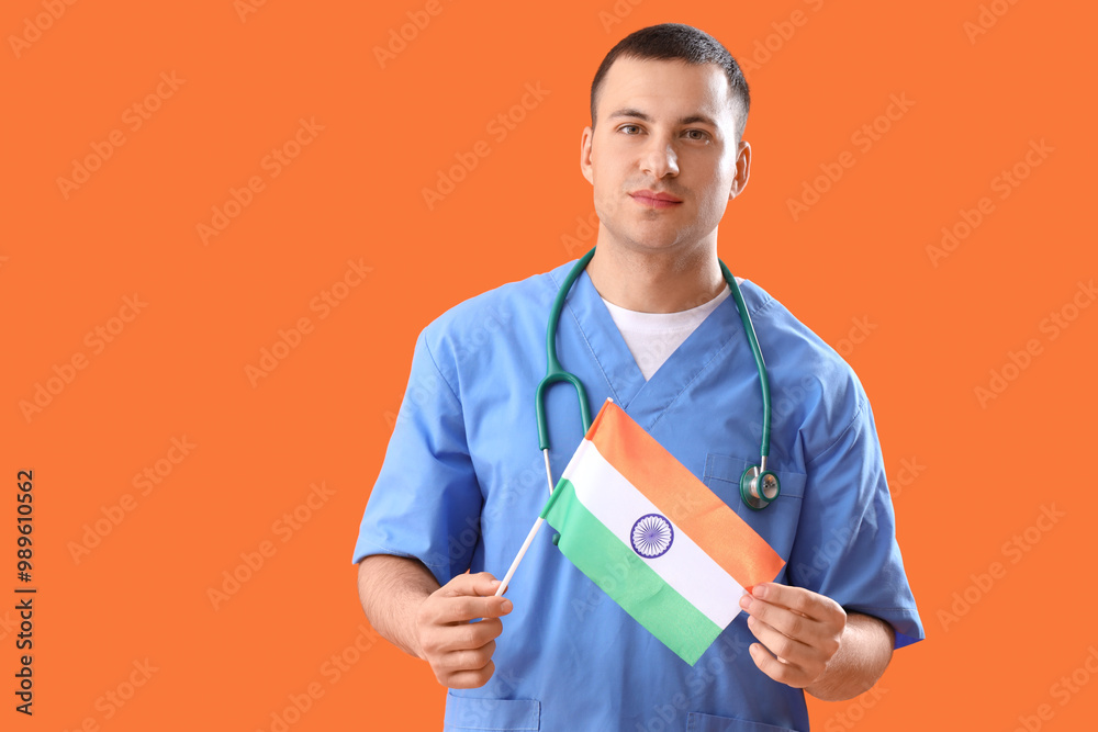 Sticker Male nurse with flag of India on orange background. National Doctor's Day celebration