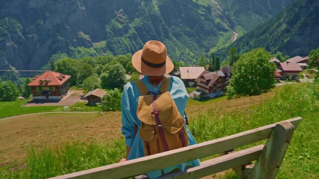 Moiry, Switzerland: Aerial drone footage of the Moiry dam above the Grimentz village in the Anniviers valley in Canton Valais in the Swiss alps in summer. Shot with a backward motion