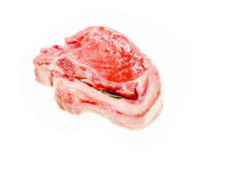 One fresh lamb loin chop on white background. Fine premium quality meat product uncooked juicy surface and herb. Butcher craft and skill.