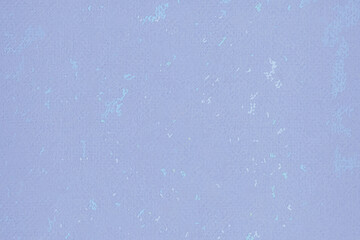 Abstract light blue background with white noise texture.