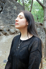 portrait of a beautiful mexican woman with long dark hair