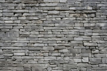 Obraz premium Historic Gray Stone Wall Background with Scenic Panoramic View of Aged Texture