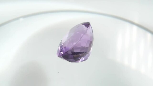 Exquisite Amethyst Gemstone Displayed on a Reflective Surface