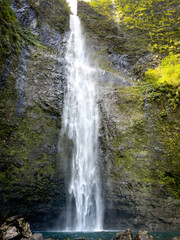 Scenic view of Hanakapiai Falls, a waterfall at the end of Hanakapiai Valley hiking trail, Kauai, Hawaii, USA