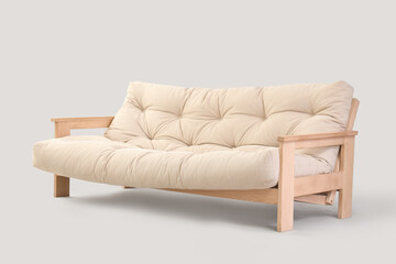 Beige sofa on light background