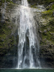 Scenic view of Hanakapiai Falls, a waterfall at the end of Hanakapiai Valley hiking trail, Kauai, Hawaii, USA