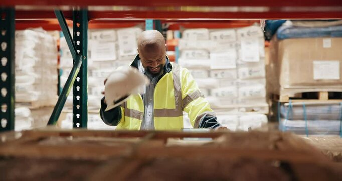 Stress, black man and logistics worker in warehouse with headache for stock inventory for distribution. Industry, burnout and African male supply chain operator for freight shipping in storage.