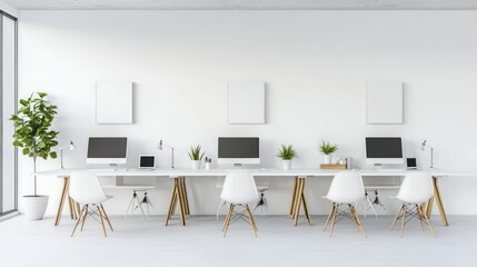 Fototapeta premium Modern office space with desks, computers, and plants for a collaborative work environment.