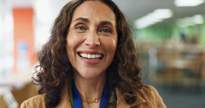 Mature woman, happy or portrait in library for education, knowledge or professional in school. Child therapist, smile or pride in book room for outsource consultation, student counseling or academics