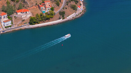 greece peloponnese region poros island houses clock tower and boats aerial view on daylight