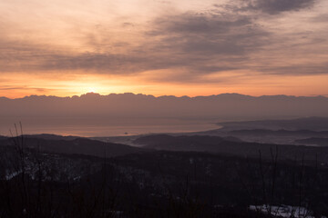夜明けの北アルプスと富山全景