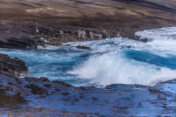 Dramatic Ocean crashing wave Hawaii at Makapu Point