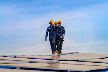 engineer man inspects construction of solar cell panel or photovoltaic cell by electronic device....