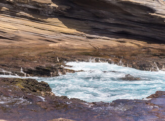 Dramatic Ocean crashing wave Hawaii at Makapu Point