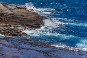 Dramatic Ocean crashing wave Hawaii at Makapu Point