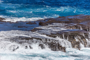 Dramatic Ocean crashing wave Hawaii at Makapu Point