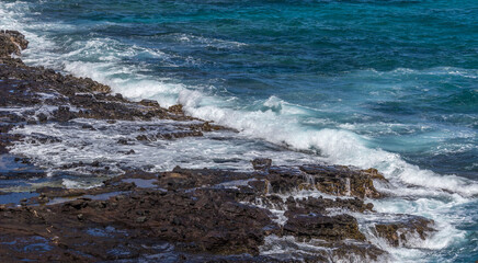 Dramatic Ocean crashing wave Hawaii at Makapu Point