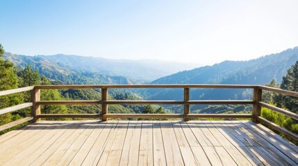 Fototapeta premium A wooden deck offers a breathtaking view of the surrounding mountains under a clear blue sky, inviting serenity and peace