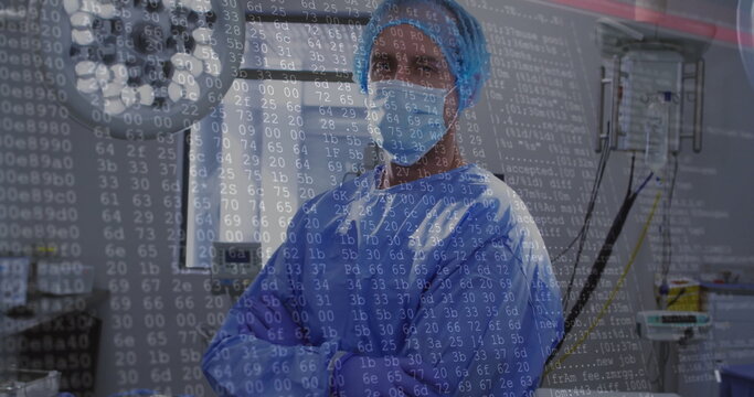 Image of data processing over caucasian male surgeon with face mask