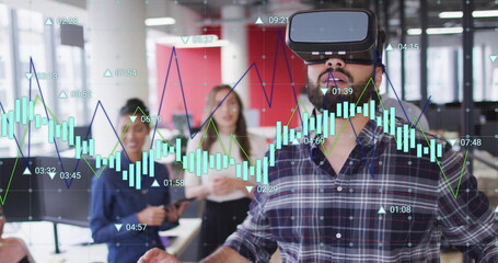 Wearing VR headset, man experiencing virtual reality over financial data image