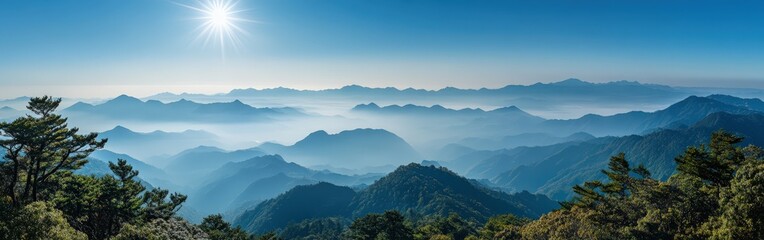 Fototapeta premium Panoramic view of mountain landscape during a golden sunset