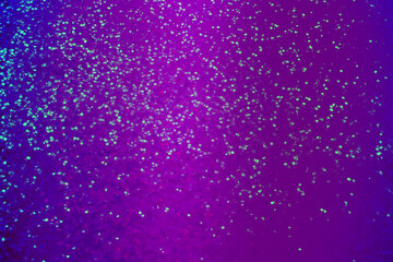 Shiny violet and blue glitter. Halloween background