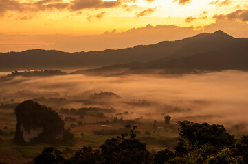 Beautiful Mountain landscape foggy windy mountain range green landscape asian farm. Amazing Landscape mountain green field meadow white cloud blue sky on sunrise. Countryside sunlight heaven scenery