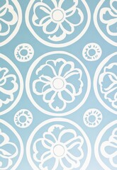 Wallpaper pattern featuring geometric circular shapes in white on a light blue background. This design creates a fresh and modern aesthetic, perfect for various interior applications.

