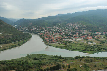 View From Jvari Monastery. The River Mtkvari Meets the River Aragvi from Khazbegi, background