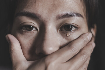 Crying woman. The concept of ​​stopping violence against women and the abuse of defenseless women, International Day for the Elimination of Violence against Women.