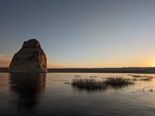 Smooth water during sunset at Lone Rock beach in Lake Powell