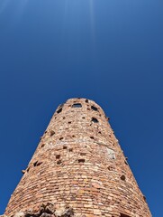Desert view watchtower with bright blue clear sky in the Grand Canyon