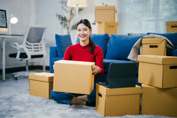 Young woman unpacks in her new home, surrounded by boxes, smiling happily as she settles in and embraces this new chapter