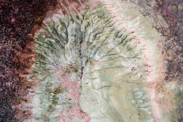 Aerial Perspective of Arid Alluvial Lake Surrounded by Mountains