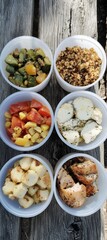 Fototapeta premium Wholesome Camp Meal for School Children Simple, Sustainable Dishes Served Outdoors in Reusable Containers
