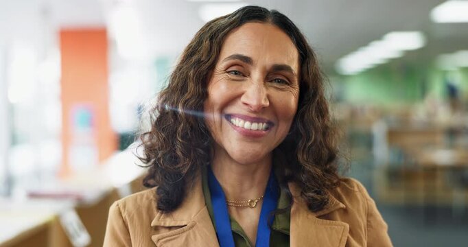 Mature woman, happy or face in library for education, knowledge or professional in school. Child therapist, smile or portrait in book room for outsource consultation, student counseling or academics
