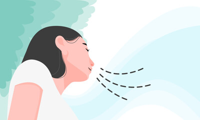 Close-up of a woman breathing in nature in low angle view.