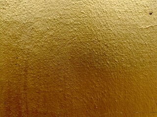 Gold color cement wall background