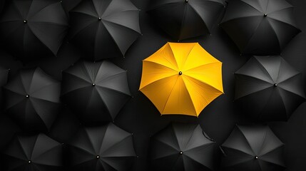 Yellow umbrella in the middle of black umbrellas, emphasizing the importance of standing out and being unique