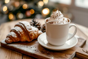 A warm winter beverage with a croissant