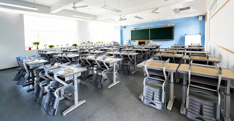School classroom with desks and chairs