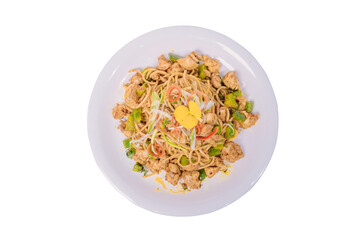 A plate of stir-fried spaghetti with chicken, vegetables, and a savory sauce, topped with a sunny-side-up egg.
