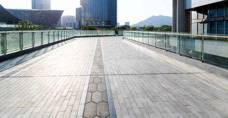 Obraz premium Empty road by the office buildings