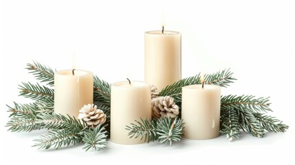 Elegant arrangement of white candles surrounded by evergreen branches and pine cones for a serene winter atmosphere