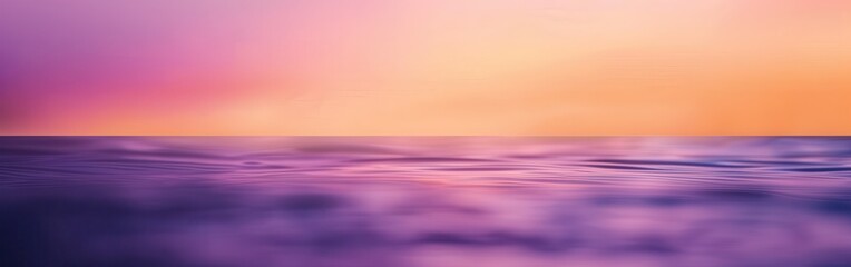 Obraz premium A beautiful ocean scene with a purple and pink sky