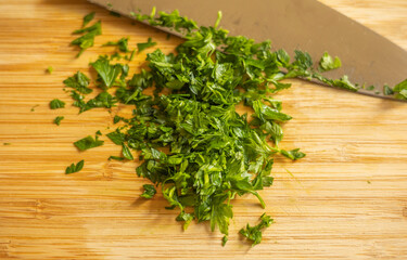 Chopped Parsley on a Cutting Board Close-Up