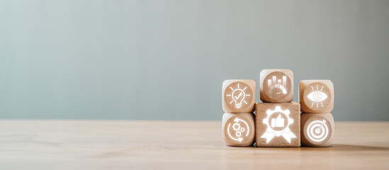 Wooden blocks with icons symbolizing best practices, strategy, innovation, and success on a neutral...
