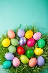 Colorful eggs arranged neatly on a grassy surface.