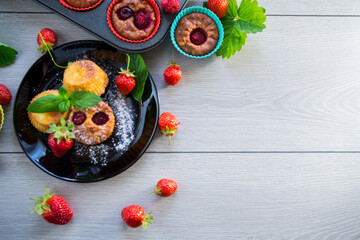 Sweet curd muffins with strawberry filling